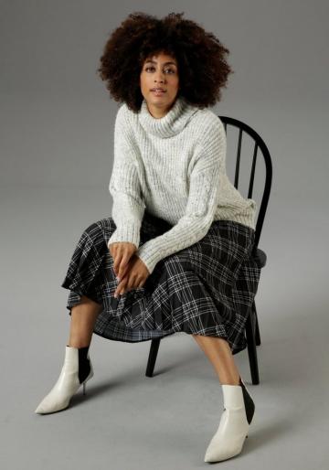 Вязаный пуловер