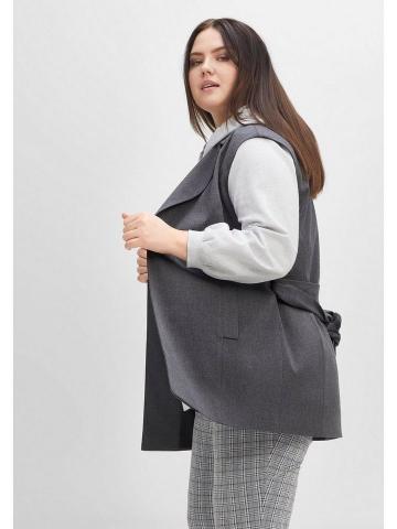 Длинный жилет