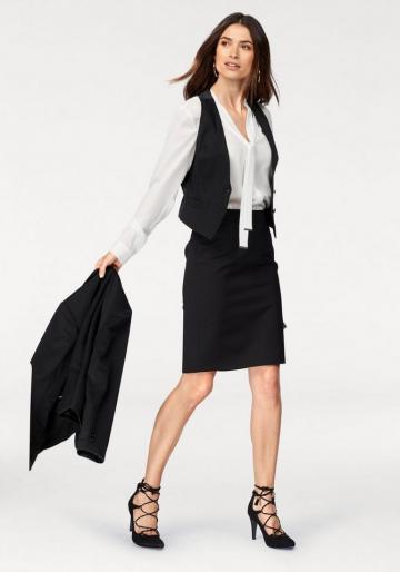 Меховая жилетка