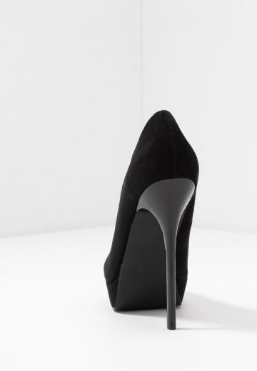 Туфли на высоком каблуке