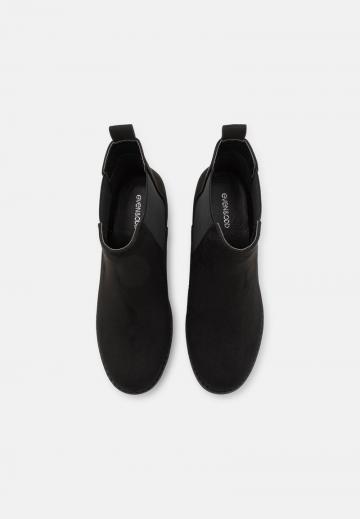 Широкие сапоги