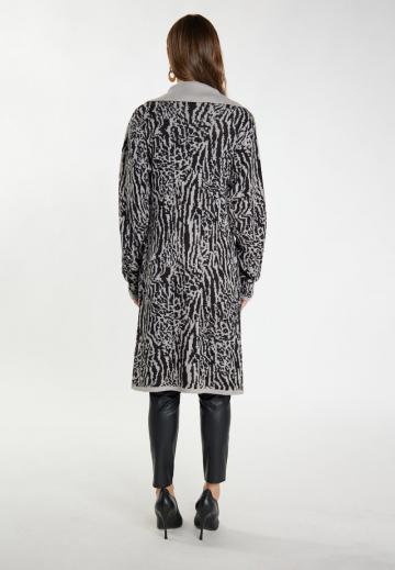 Длинный жилет