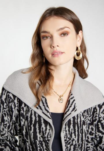 Длинный жилет