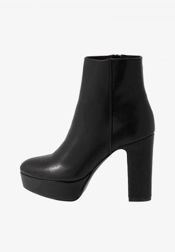 Полусапожки на высоком каблуке