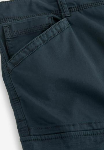 Брюки с накладными карманами