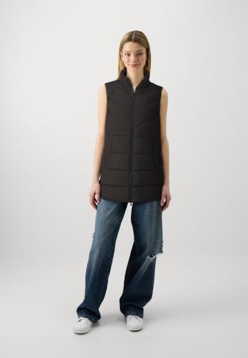 Длинный жилет