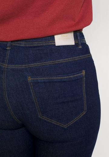 Клешеные джинсы