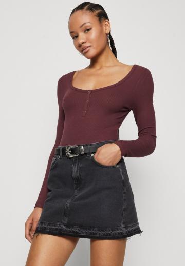 Юбка с накладными карманами