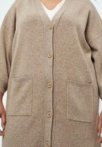 Длинный жилет