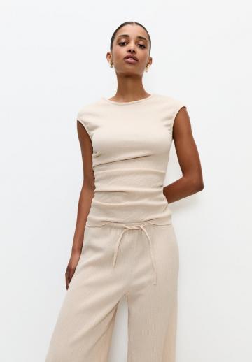 Блузка без рукавов