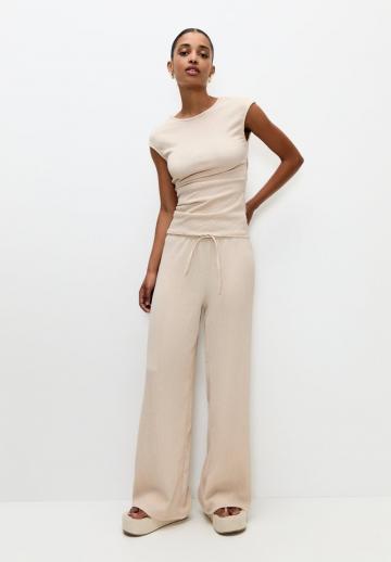 Блузка без рукавов