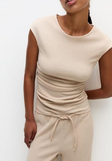 Блузка без рукавов