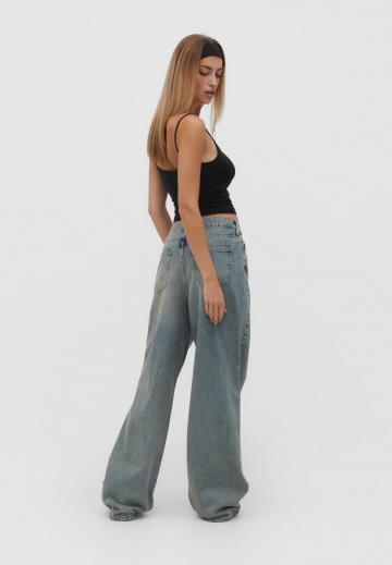 Клешеные джинсы