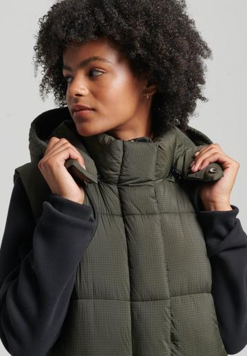 Длинный жилет