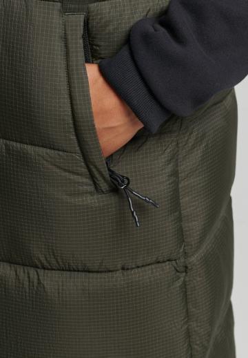 Длинный жилет