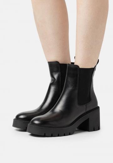 Широкие сапоги