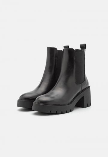 Широкие сапоги