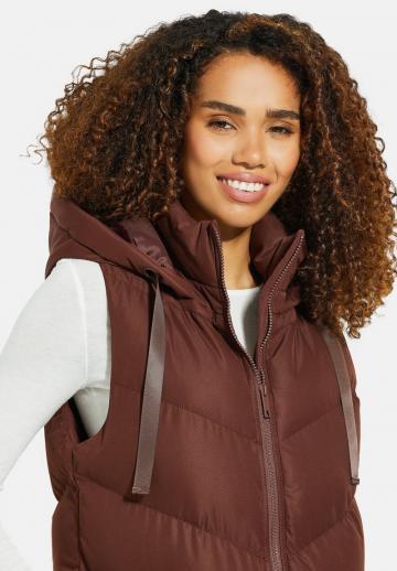 Длинный жилет