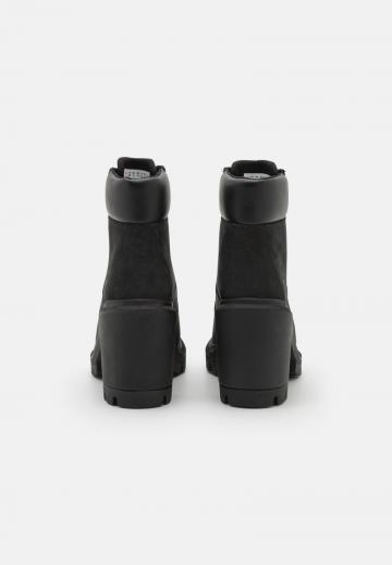 Высокие сапоги