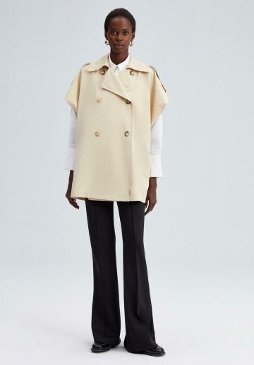 Длинный жилет