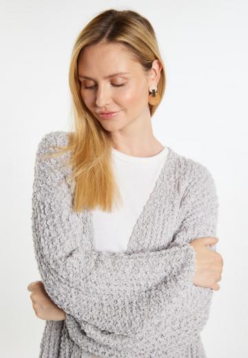 Длинный жилет