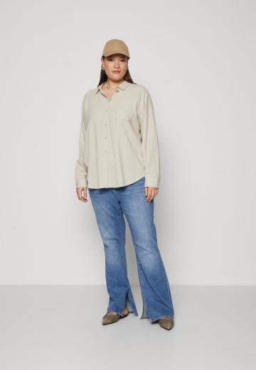 Длинная блузка