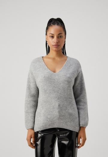 Длинный пуловер