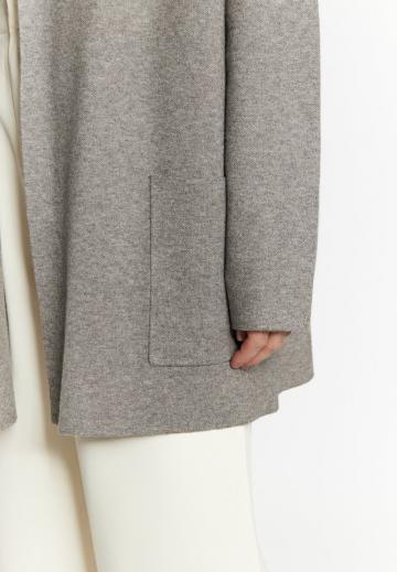 Длинный жилет