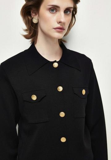 Вязаный жилет