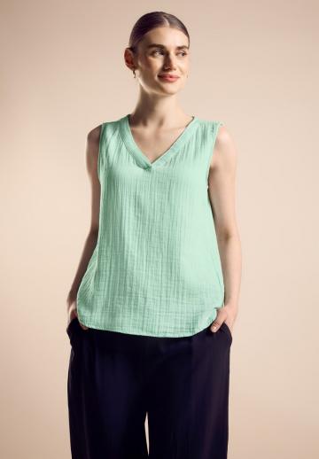 Блузка без рукавов