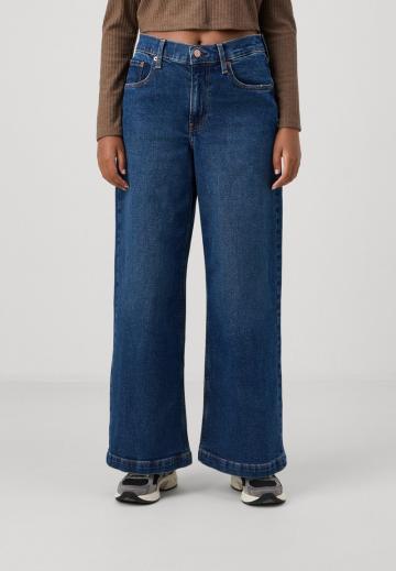 Клешеные джинсы