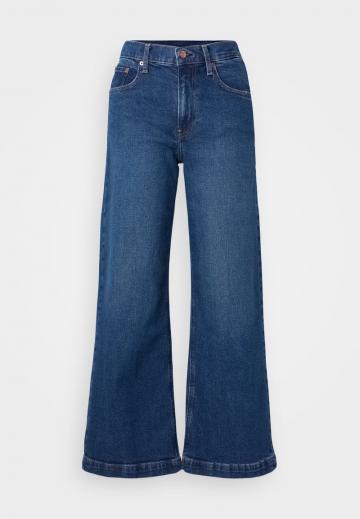 Клешеные джинсы