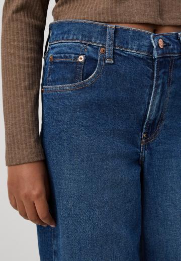 Клешеные джинсы