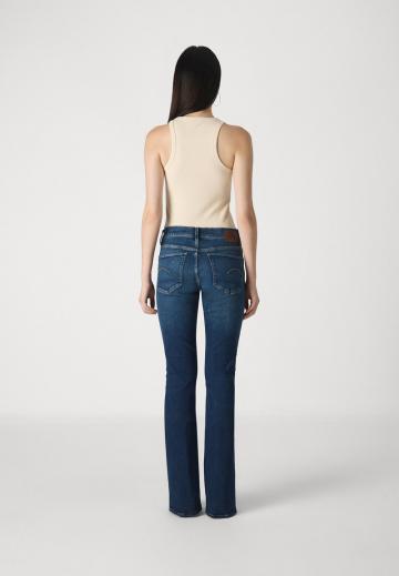 Клешеные брюки