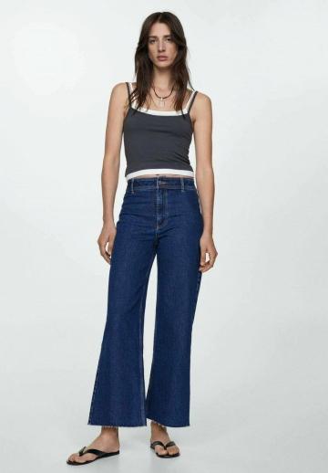 Клешеные джинсы