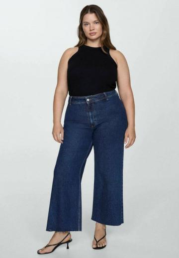 Клешеные джинсы