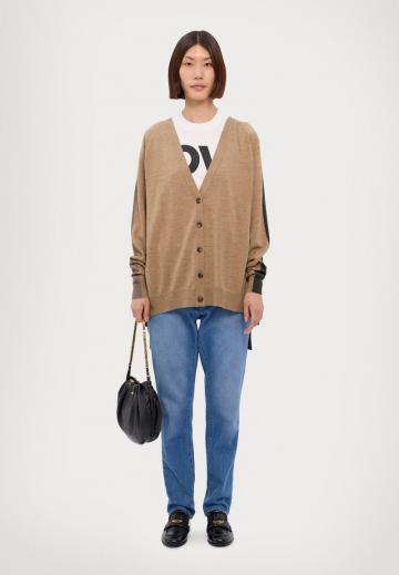 Длинный жилет