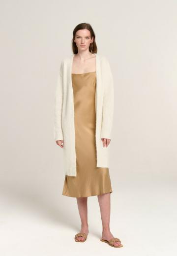 Длинный жилет