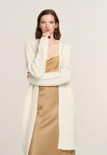 Длинный жилет