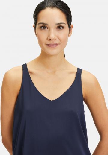 Блузка без рукавов