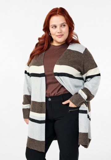 Длинный жилет