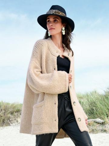 Длинная вязаная кофта