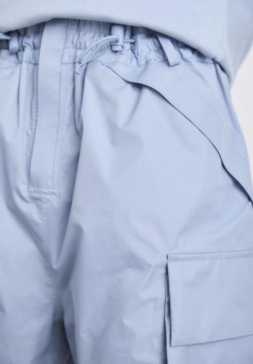 Брюки с накладными карманами