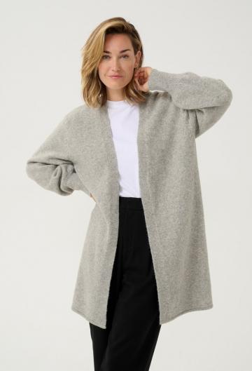 Длинный жилет