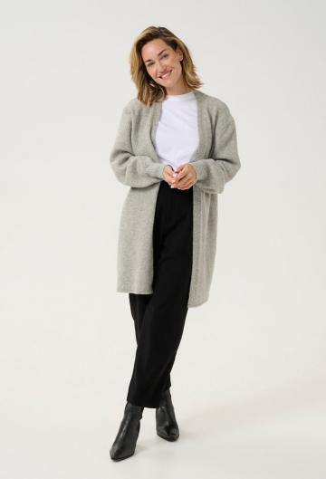 Длинный жилет