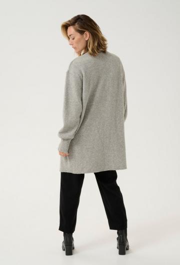 Длинный жилет