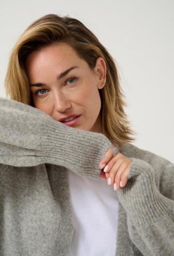 Длинный жилет