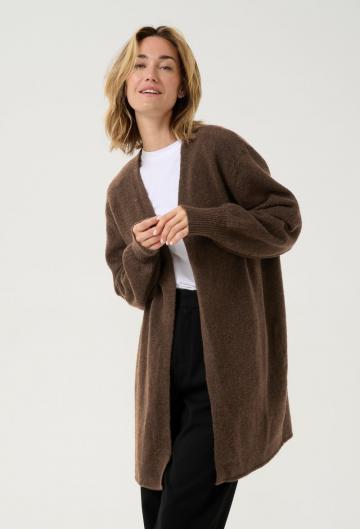 Длинный жилет