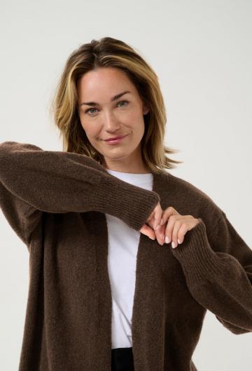 Длинный жилет