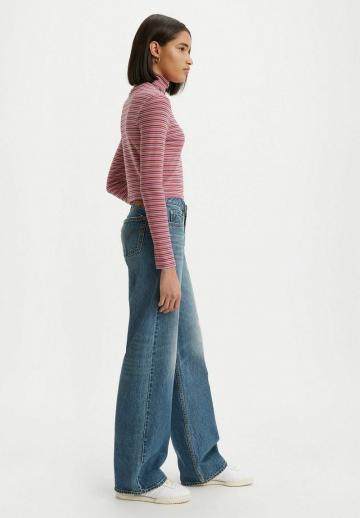 Клешеные джинсы